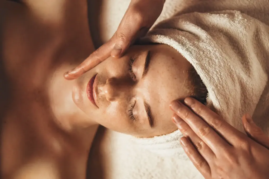 Woman enjoying a facial treatment.